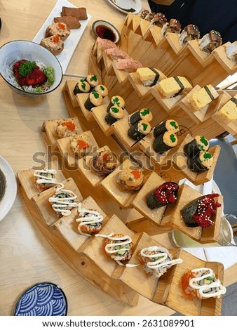 a delectable sushi platter featuring assorted rolls and nigiri, a japanese culinary delight