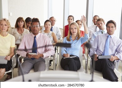 Delegate Asking Question At Business Conference