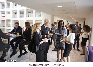 Delegates Networking During Conference Lunch Break