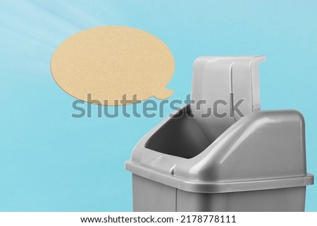 Delete the message, refuse to speak. Throw away the speech bubble in the trash can, gray bucket on a blue background