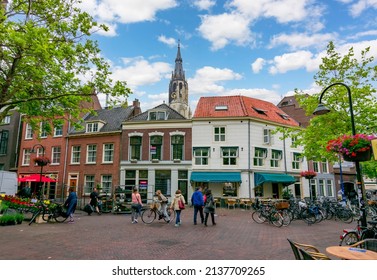 Delft, Netherlands - June 2018: Delft streets and New church tower