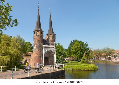 Delft, The Netherlands, June 7, 2021; Former city gate "De Oostpoort" and a white drawbridge on the edge of the picturesque town of Delft.