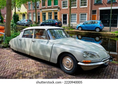 Delft, Netherlands - May 12, 2017: Retro Vintage Luxury Car Citroen DS In Street Of Delft Near Canal