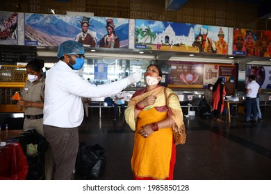 Delhi, India - 06-02-2021 - A Medical Worker Takes A Swab Sample  For A Reverse Transcription Polymerase Chain Reaction (RT-PCR) Test For Covid-19 During Random Testing At Railway Station In Delhi.