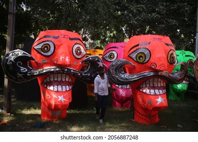 Delhi, India - 10-13-2021 - A Man Paints An Effigy Of The Demon King Ravana Ahead Of 'Dussehra' Festival Celebration In New Delhi.