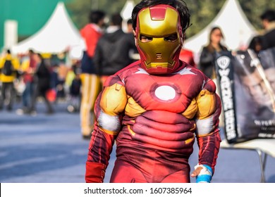 Delhi, India 2019 : Child Dressed In Costume Of Iron Man Posing For Photograph In Comic Con Festival. Iron Man Is A Marvel Movie Character