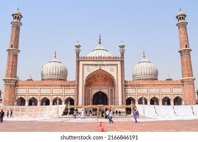 Delhi, India - April 15, 2022 : Unidentified Indian tourists visiting Jama Masjid during Ramzan season, in Delhi 6, India. Jama Masjid is the largest and perhaps the most magnificent mosque in India