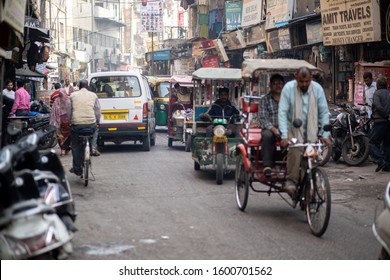 Delhi, India - December 04, 2019: People on busy street at Main Bazaar in Paharganj district.