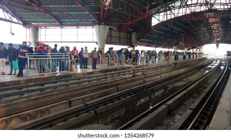 Delhi, India - March 29, 2019: People Wait For Metro Train In Kashmiri Gate Station. Delhi