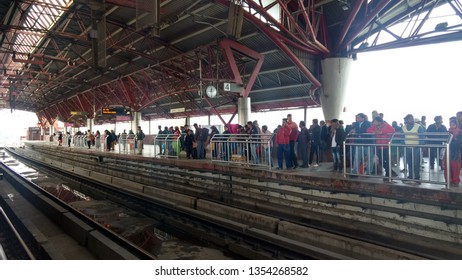 Delhi, India - March 29, 2019: People Wait For Metro Train In Kashmiri Gate Station. Delhi