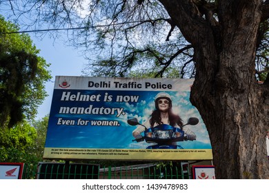 Delhi, India - May 3 2019: Billboard With Delhi Traffic Police Warning, Depicting A Woman With A Helmet.