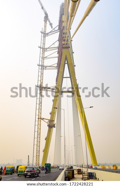 DELHI, INDIA, SEPTEMBER 05, 2019: View of the\
Signature bridge being constructed across the Yamuna river in New\
Delhi India