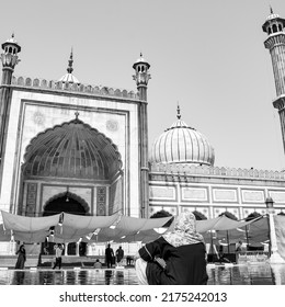 Delhi, India-April 15,2022: Unidentified Indian tourist visiting Jama Masjid during Ramzan season in Delhi 6, India. Jama Masjid is largest and perhaps most magnificent mosque in India Black and White