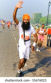 DELHI - OCTOBER 28: Young bearded Sikh man with turban competing in marathon on October 28th, 2007 in Delhi, India. The 2009 event attracted around 29,000 runners.