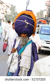 DELHI - SEPTEMBER 22:  Sikh warrior with a turban and lance on street on September 22, 2007 in Delhi, India. Traditionally warriors carry a dagger.