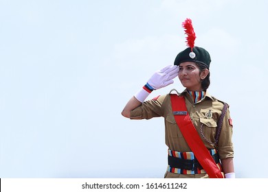 Delhi,India - 21St January 2019: Lady Army Soilder Nation Hero Saluting With Pride Outdoor In Daytime, Celebrating Republic And Independence Day And  Women Empowerment Concept. Copy Space For Text.