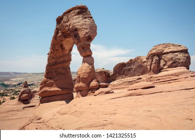 Delicate Arch Rock Formation And Slanting Sandstone From Side View, No People. Arches National Park Near Moab, Utah.