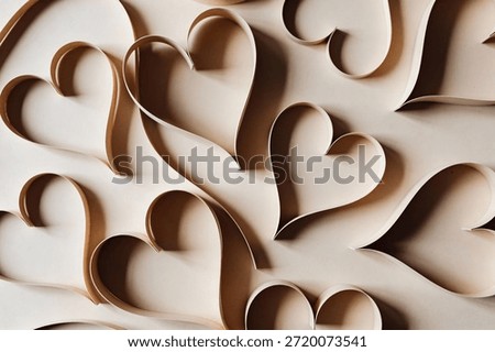 A delicate and artistic composition featuring multiple folded paper hearts creating a visually pleasing and romantic background