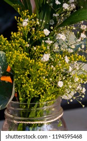 Delicate Floral Arrangement On Table In Restaurant For First Baptism Or First Communion In Central America. Guatemala.