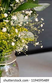 Delicate Floral Arrangement On Table In Restaurant For First Baptism Or First Communion In Central America. Guatemala.