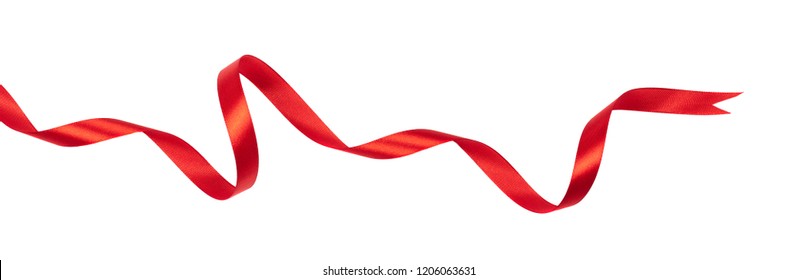 Delicate red wavy ribbon isolated on white background. New Year or Christmas holidays decoration concept.