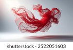 Delicate Sheer Red Fabric Floating Gracefully in Pure White Background