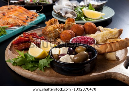 A delicious ant pasta platter, seafood in the background. Stock photo © 