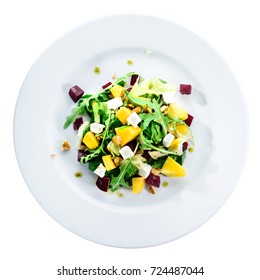 Delicious And Appetizing Salad With Avocado, Cheese And Lettuce In A White Plate Isolated On White Background, Top View, Flat, Overhead. Autumn Menu In An Italian Restaurant. Photo For Menu Design