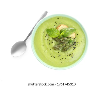 Delicious Asparagus Soup With Basil And Sesame Seeds Isolated On White, Top View