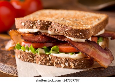 A delicious bacon, lettuce, and tomato blt sandwich.