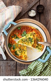 Delicious baked fritatta with peas, potatoes and fresh parsley
