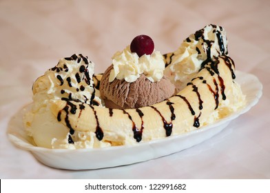 Delicious Banana Split On White Plate