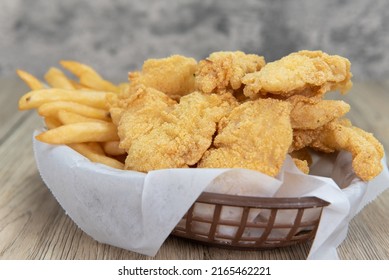 Delicious Basket Of Fried Fish And Chips For A Tasty Fastfood Seafood Meal.