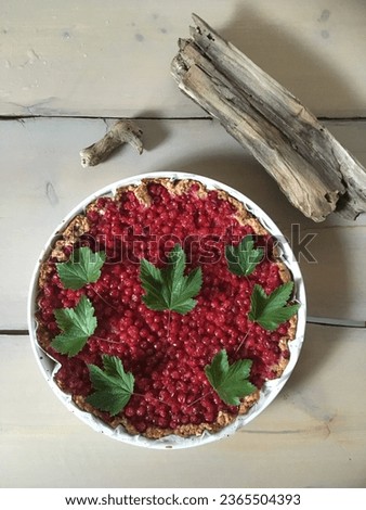 delicious berry pie on a wooden table. Self-baked
