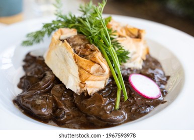 Delicious Breaded Beef Steak Plate With Mushroom Sauce And Parsley Leaves. Gourmet Restaurant, Non Vegetarian Food Concepts