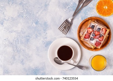 Delicious breakfast on a light table. Top view, copy space.