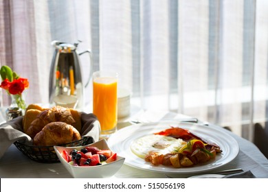 Delicious Breakfast With Pastries, Eggs, Fruits And Juice Served In Hotel Room, In-room Dining, Contrast View, Hospitality And Vacation Concept