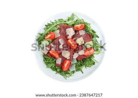 Delicious bresaola salad with parmesan cheese isolated on white, top view