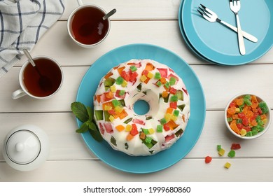 Delicious Broken Glass Jelly Cake On White Wooden Table, Flat Lay