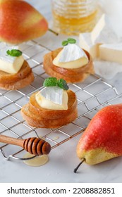 Delicious Bruschetta With Caramelized Pear, Camembert Or Brie Cheese, Honey And Mint. Fruit Dessert. Bread Toast, Crostini. Healthy Breakfast For Gourmets. Selective Focus, Copy Space