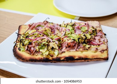 Delicious Brussels Sprout And Prosciutto Flatbread On A Plate