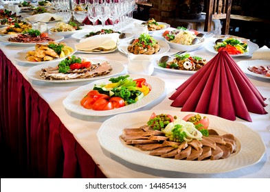 Delicious Buffet Table At A Luxury Event Spread With A Variety Of Cold Meat Platters And Fresh Colorful Salad And Vegetables