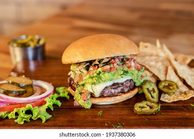 Delicious Burger On Wooden Table Fast Food