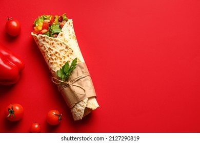 Delicious Burrito On Red Background