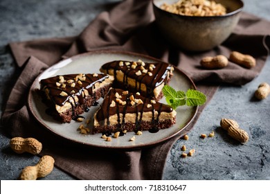 Delicious Cake With Peanut Butter Cream Layer And Chocolate Topping