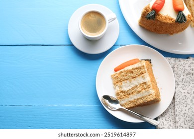 Delicious carrot cake served with coffee on blue wooden table, flat lay. Space for text