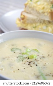 Delicious Celery Soup With Egg Salad Sandwich In The Background Vertical