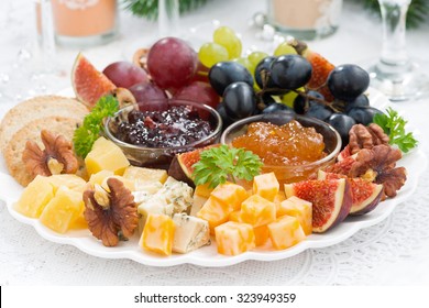 Delicious Cheese And Fruit Plate To The Holiday, Closeup