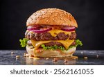 A delicious cheeseburger showcases layers of flavorful beef patties, melted cheese, crisp lettuce, red onions, and sesame seed bun, served on a dark surface.