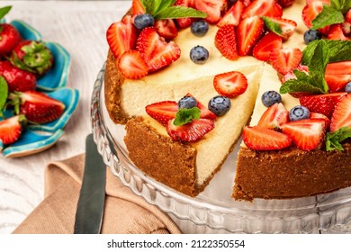 Delicious cheesecake with fresh strawberries for dessert. healthy organic summer berry dessert cheesecake. Homemade cheese cake.